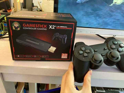 Game Stick X2 conectado a televisor por HDMI mostrando juegos retro